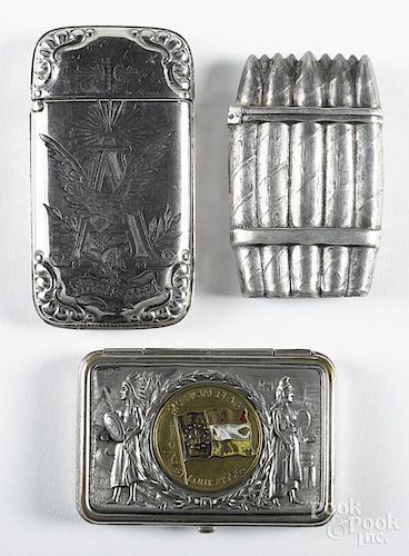 Three nickel silver match vesta safes, ca. 1900, one with the flag of St. Louis 1904