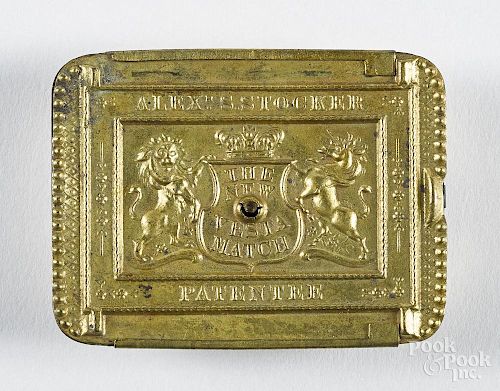 English embossed brass Alex Stocker match vesta safe, ca. 1900, with a slide lid, 2 1/2'' w.