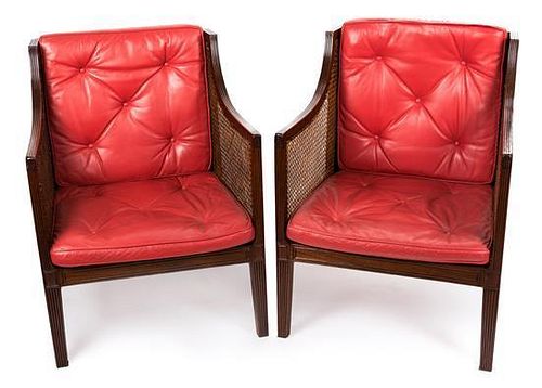 A Pair of Regency Style Mahogany Armchairs Height 33 inches.