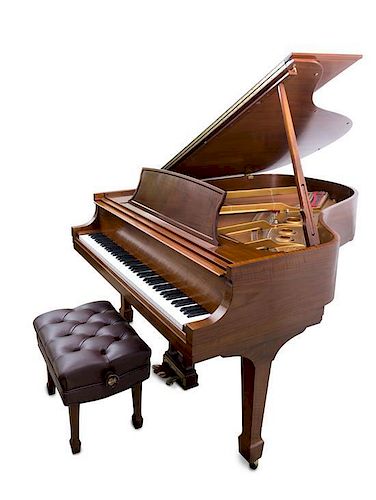 A Steinway & Sons Baby Grand Piano