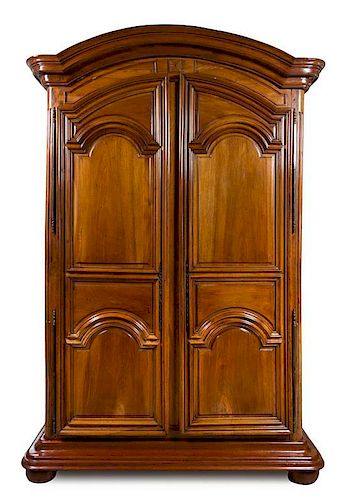 A French Provincial Walnut Armoire Height 97 x width 64 x depth 27 inches.