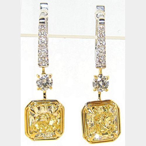 7.16CT. Fancy Yellow Canary 18k Two Tone Gold Diamond Earrings. GIA Certified.