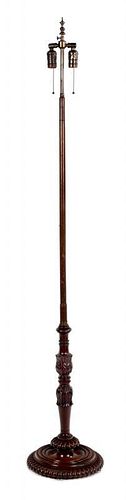 A Regency Style Carved Mahogany Standing Lamp Height 50 inches.