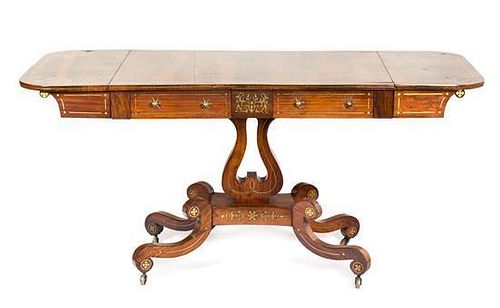A Late Regency Brass-Inlaid Rosewood Sofa Table Height 27 x width (extended) 77 x depth 24 inches.
