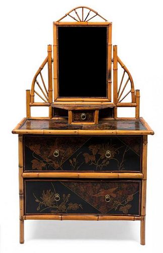 A Victorian Bamboo and Lacquered Dressing Table Height 61 x width 35 x depth 17 1/2 inches.