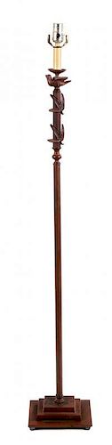 A Contemporary Patinated Metal Standing Lamp Height 45 inches.