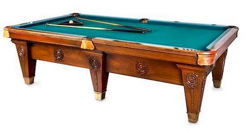 A Brunswick Mahogany Pool Table Height 32 x width 112 x depth 60 inches.