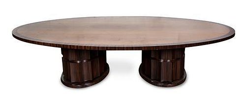 An Art Deco Style Palisander and Satinwood Pedestal Dining Table Height 29 x width 124 x depth 70 inches.