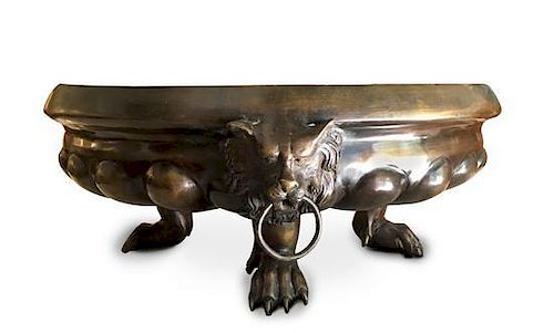 A Continental Patinated-Metal Jardiniere Height 7 x diameter 16 inches.