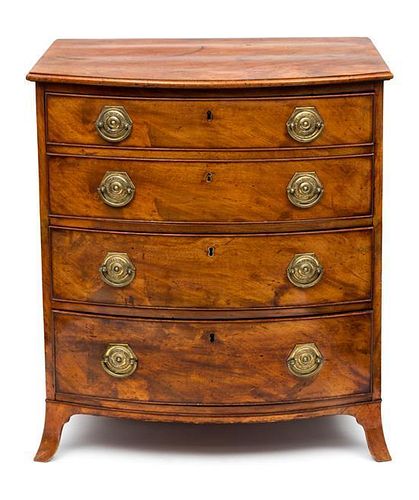 A Regency Mahogany Small Chest of Drawers Height 32 x width 28 x depth 20 1/2 inches.