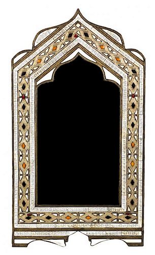 A Middle Eastern Silvered Metal and Bone Inlaid and Hardstone Inlaid Mirror 42 x 23 1/2 inches.