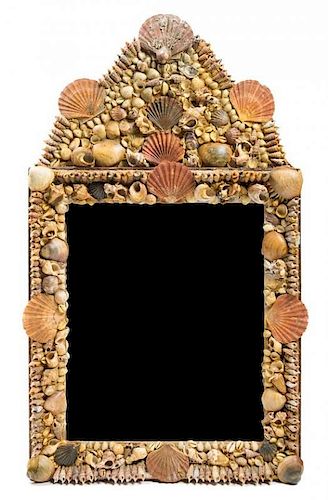A Shell-Encrusted Mirror 40 x 22 inches.