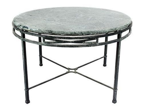 A Baroque Style Cast-Iron and Marble Center Table Height 30 x diameter 46 inches.