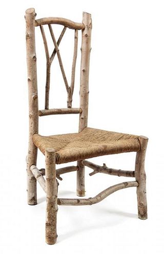 A Twig and Rush Seat Child's Chair Height 28 inches.