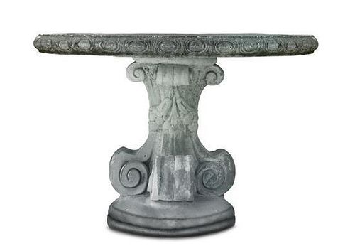 A Soapstone Composite Center Table Height 30 x diameter 42 1/2 inches.