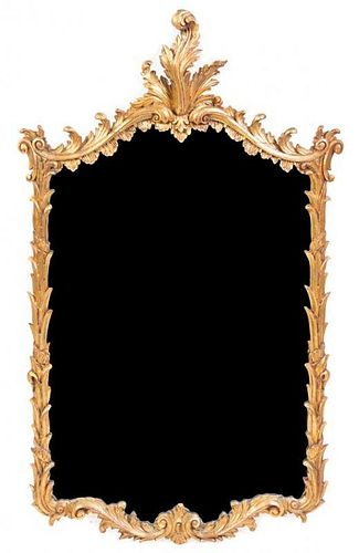 A Rococo Style Giltwood Mirror Width 26 1/2 inches.