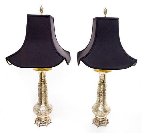 A Pair of Silvered Metal Lamps Height overall 29 1/2 inches.