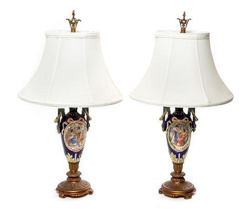 * A Pair of Continental Porcelain Vases Height overall 22 inches.