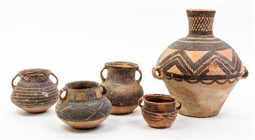 * A Group of Nine Neolithic Style Pottery Vessels Height of tallest 12 inches.