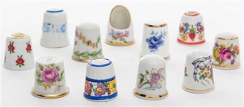 A Group of Porcelain Thimbles Height of first 1 1/8 inches.