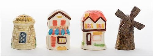 A Collection of Four Building Form Thimbles Height of tallest 1 1/2 inches,