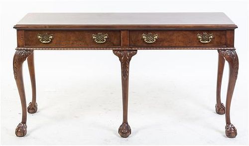 A Baker Chippendale Style Mahogany Console Table Height 28 1/2 x width 54 x depth 15 3/4 inches.