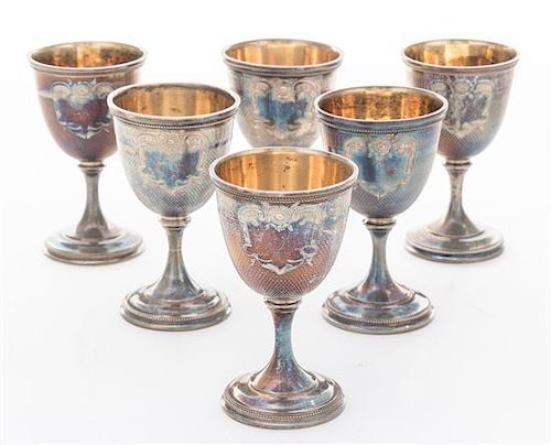 * A Set of Six Silver-plate Cordials Height 3 inches.
