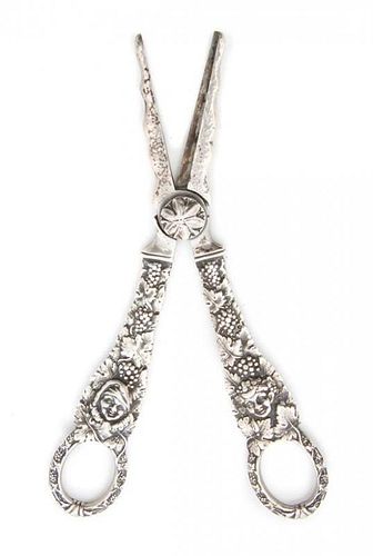 * A Pair of Silver Grape Shears, Georg Jensen, of typical form, decorated with figures amongst grape vines.