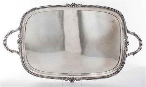 * A Sheffield-plate Two-Handled Tray, , of rounded rectangular form and having a gadrooned border.