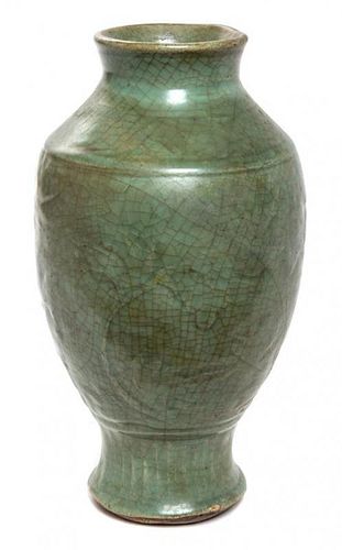 A Longquan Celadon Glazed Porcelain Vase Length 12 1/4 inches.