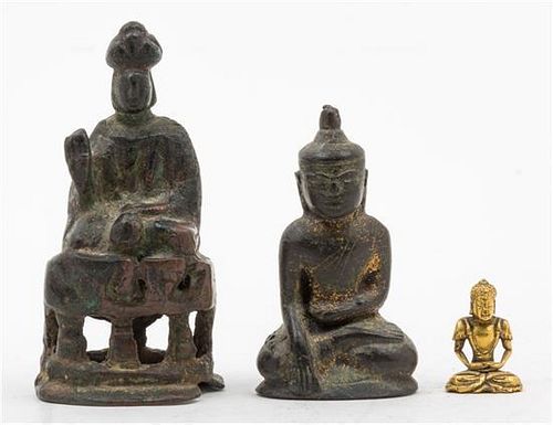 Three Small Bronze Figures of Buddha. Height of tallest 2 3/4 inches.