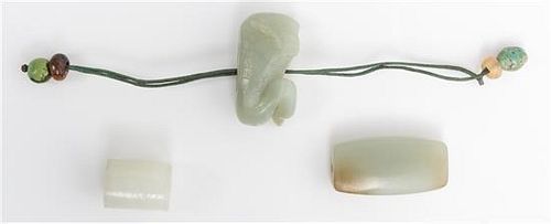 Three Celadon Jade Pendants Length of largest 1 1/2 inches.