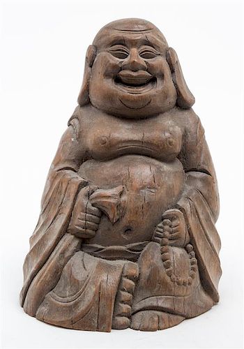 A Carved Bamboo Figure of a Mile Buddha. Height 9 inches.