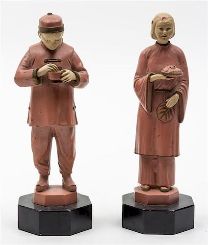 A Pair of Tin Figures Height 9 inches.