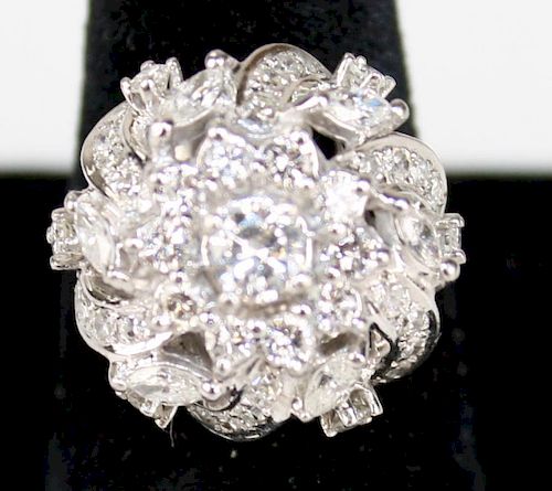 14k w.g. ladies diamond ring, center ¼ rd cut diamond surrounded by extravagant floral form setting
