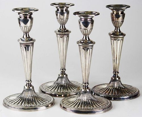 set of 4 Sheffield Adam design weighted silver candlesticks, ht 10 3/4”
