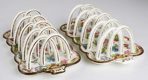 pr of Minton toast racks, one with hairline crack, length 8.5”