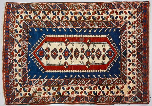 Three Antique Oriental Carpets