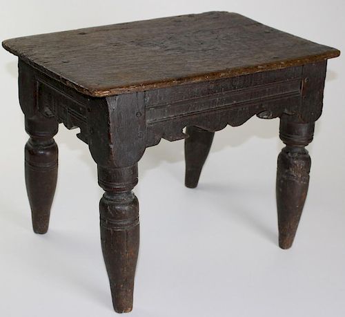 17th c oak stool with shaped skirt and molded sides. 17½"l x 13½"h x 11"d.