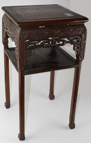 19th c Chinese carved stand with pink marble top. Lower shelf. 32"h.