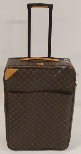 COUTURE. Louis Vuitton Rolling Suitcase Luggage.