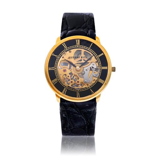 Tiffany and Co gold and enamel skeletonized wristwatch, 18k gold