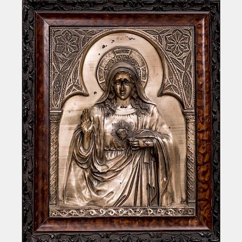 A Continental Silvered Repousse Icon Depicting the Madonna, 19th Century.