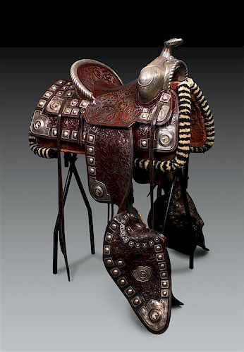 A Silver and 14 Karat Gold Mounted Leather Parade Saddle Set, Nolte-Olsen, Seat 15 inches.