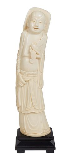 Chinese Carved Ivory Standing Hotei Figure, early 20th c., on an ebonized stand, Figure- H.- 10 1/4 in., W.- 2 3/8 in., D.- 2 1/8 in.