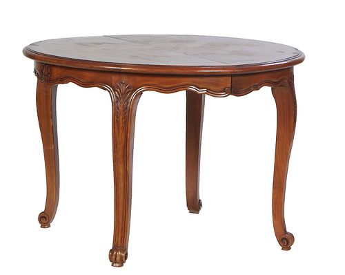 French Louis XV Style Carved Cherry Circular Dining Table, 20th c., the stepped rounded edge parquetry inlaid top over a serpentine skirt, on reeded s