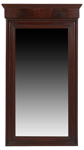 American Classical Carved Mahogany Overmantel Mirror, 19th c., the stepped crown over a wide frieze above a wide cove molded frame, around a rectangul