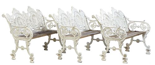 Three Matching Antique Style Cast Aluminum Garden Benches, 20th c., the canted relief figural double medallion back to pierced scrolled arms, joined b