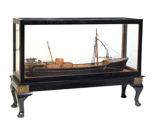 Large Polychromed Wood and Brass Ship's Model, early 20th c., mounted on ablack lacquer and brass base with Queen Anne legs, presented in a custom bui