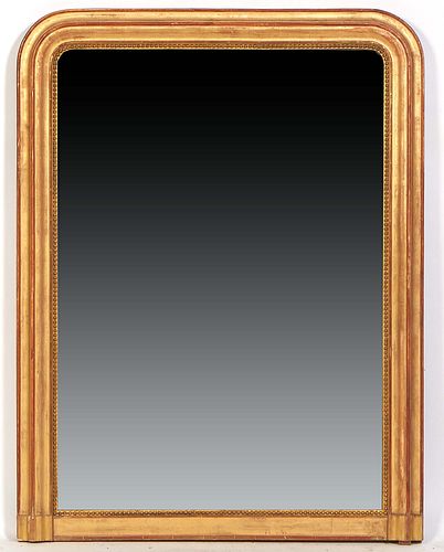 French Louis Philippe Carved Oak Gilt Overmantel Mirror, 19th c., the arched cove molded frame around a beaded liner and an arched mirror plate, H.- 5